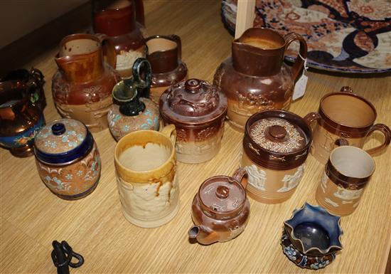 A collection of Doulton stoneware jugs, etc.
